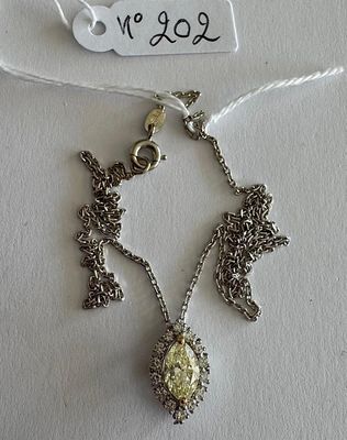 Chaîne en or jaune, maille Forçat, soutenant un pendentif en…