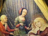 an image of a painting on a wall of a woman and a man