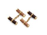 three pairs of wooden and leather cufflinks on a white background