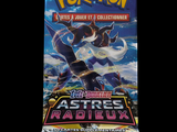 a close up of a bag of pokemon trading cards on a black background