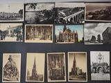 many old photographs of different buildings on the wall
