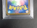 an image of a pokemon card in a plastic case