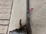 an image of a blower on the ground with a blower attached to it