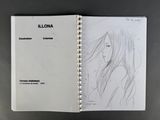 an open notebook with a drawing of a woman ' s face on it