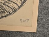 a picture of a drawing on a piece of paper on the floor