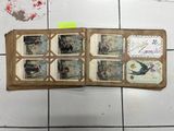 a picture of an open book on a tiled floor