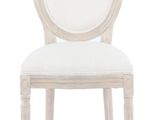 an image of a white chair with a white cushion on it