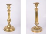 pair of antique brass candlesticks on marble bases