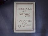 a sign that says bestecke aus sohngenn garantite fur quatit