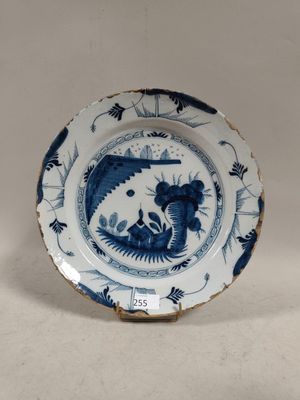 an image of a blue and white plate with a dragon on it