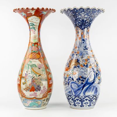 pair of chinese vases on a white background with a white background