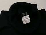 chanel logo on the back of a black t - shirt