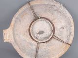 an image of a white plate with a circular design