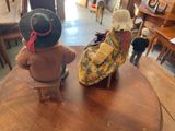 two teddy bears that are sitting on a table