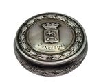 an image of a small silver box with a crown on it