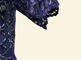 a close up of a woman ' s dress with a purple lace overlay