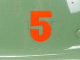 a close up of a helmet with the number 5 on it