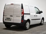 a white van that is parked in a room