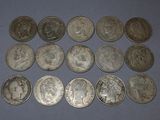 a close up of a bunch of coins on a table