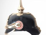 a black helmet with a red and white stripe on it
