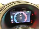 the dashboard of a car with a digital display in the center