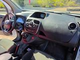 a car dashboard with a steering wheel and a dash board