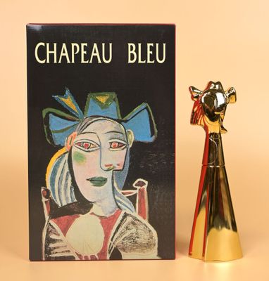 a book and a figurine on a table