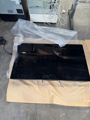 a cardboard box with a piece of black material on it