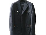 an image of a black jacket hanging on a hanger