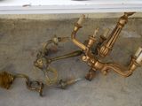 a picture of a brass chandelier on the floor
