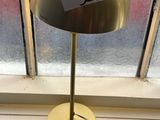 a lamp that is sitting on a window sill