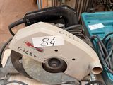 a picture of a circular saw sitting on top of a table