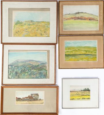 many paintings hanging on the wall of a room