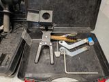 a tool case with tools in it sitting on a table