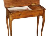 a small wooden desk with a drawer on it