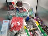 a pile of assorted items sitting on a counter