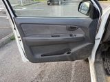 a car door with the driver ' s side door open