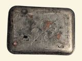 a small metal box that has some paint on it