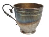 a silver cup with a handle on a white background