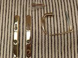 two handles and a latch on the floor