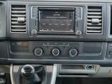 a dashboard of a car with a radio and a steering wheel