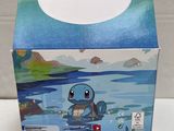 a box that has a picture of a pokemon figure on it