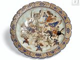 a plate with a painting on it on a white surface