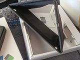 a box with a laptop inside of it sitting on a table