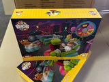 the box is open on the table next to the toy car
