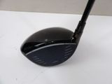 a close up of a golf driver on a table