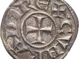 a close up of a coin on a white background