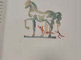 a picture of a book with a picture of a horse on it
