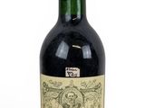 a bottle of wine that is sitting on a table
