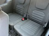 two seats in the back of a car that are empty